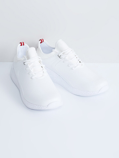 

max Men White Solid Sneakers