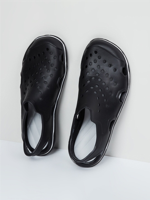 

max Men Black Self Design Clogs