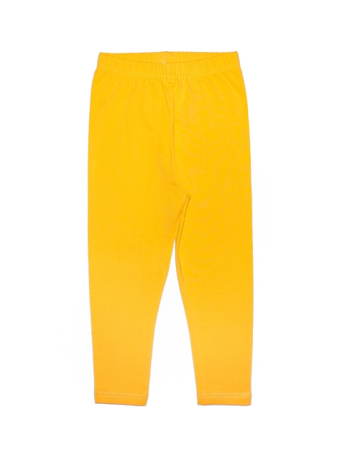 

KiddoPanti Girls Yellow Solid Churidhar Length Leggings