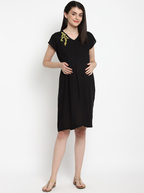 

The Vanca Women Maternity Black Solid Fit and Flare Dress