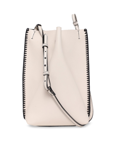 

CHARLES & KEITH Off-White Solid Sling Bag