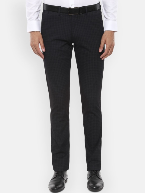 

Van Heusen Men Black Slim Fit Self Design Formal Trousers