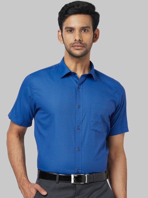 

Park Avenue Men Blue Regular Fit Solid Formal Shirt