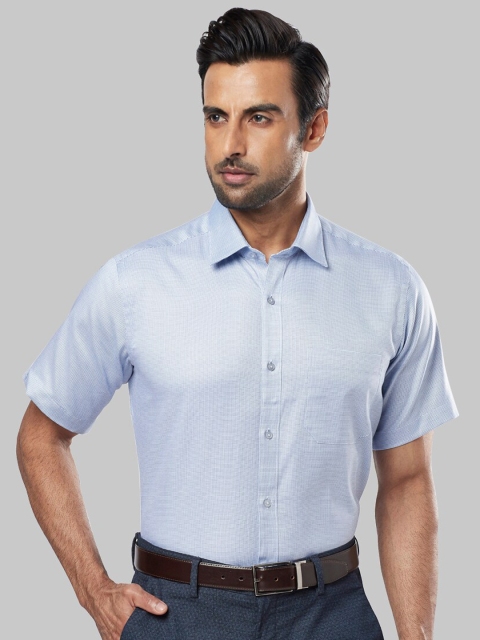 

Raymond Men Blue Regular Fit Solid Formal Shirt