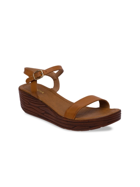 

Rocia Women Beige Solid Wedges
