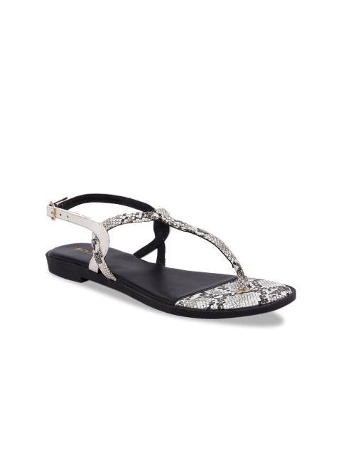 

Rocia Women White Textured T-Strap Flats