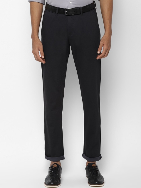 

Allen Solly Men Black Carrot Slim Fit Self Design Regular Trousers