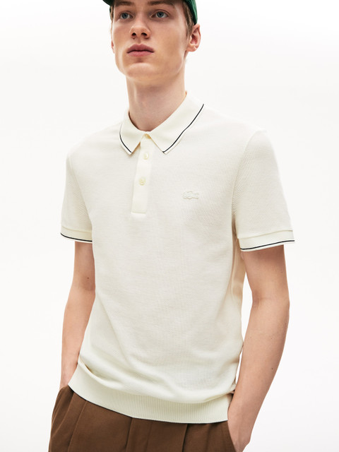 

Lacoste Men White Solid Polo Collar T-shirt