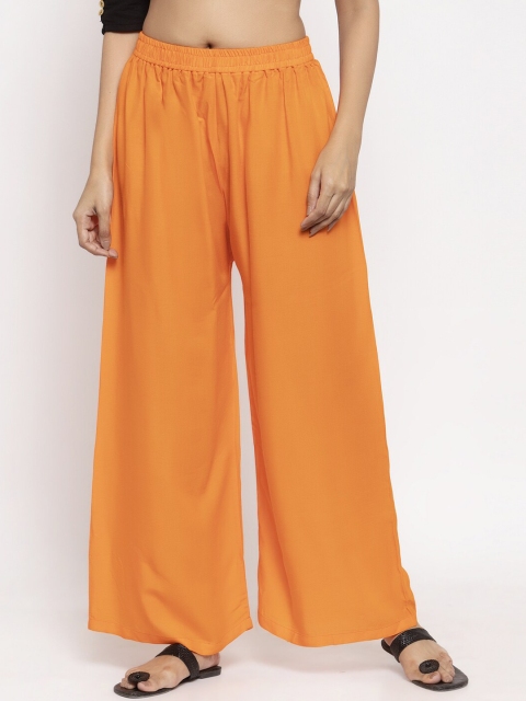 

NEUDIS Women Orange Solid Flared Palazzos