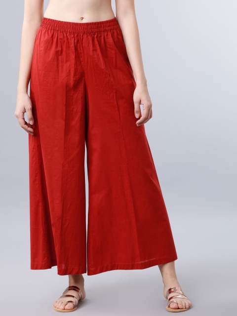

Vishudh Women Red Solid Flared Leg Palazzos