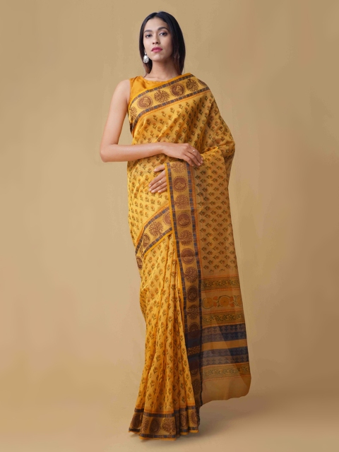 

Unnati Silks Yellow Printed Supernet Saree