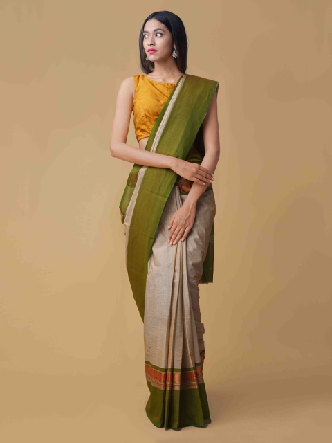 

Unnati Silks Khaki & Green Pure Cotton Solid Saree