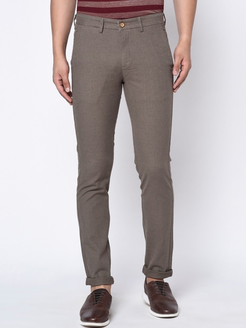 

Octave Men Brown Regular Fit Self Design Regular Trousers