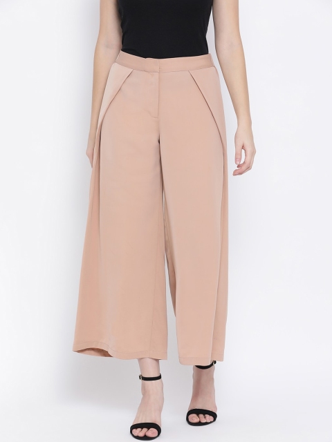 

Oxolloxo Women Beige Solid Straight Palazzos