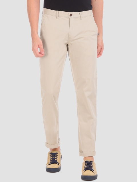 

Arrow Men Beige Regular Fit Solid Chinos