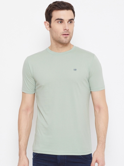 

Okane Men Green Solid Round Neck T-shirt