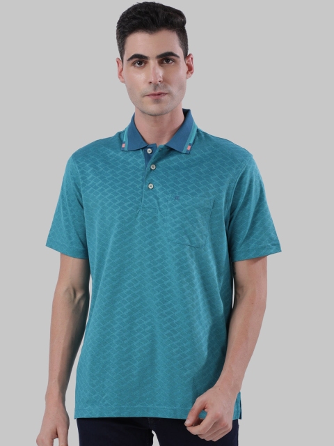 

Raymond Men Blue Self Design Polo Collar T-shirt