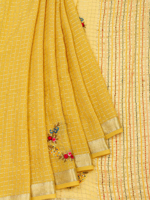 

Vijayalakshmi Silks Yellow & Gold Pure Georgette Checked Silk Saree