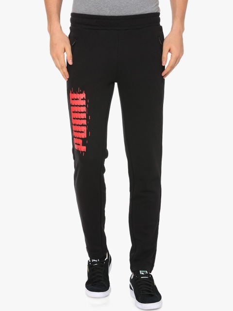 

Puma Men Black & Orange Printed Slim Fit Track Pants
