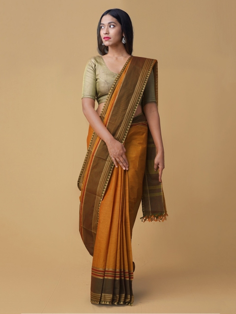 

Unnati Silks Orange Solid Pure Cotton Handloom Saree