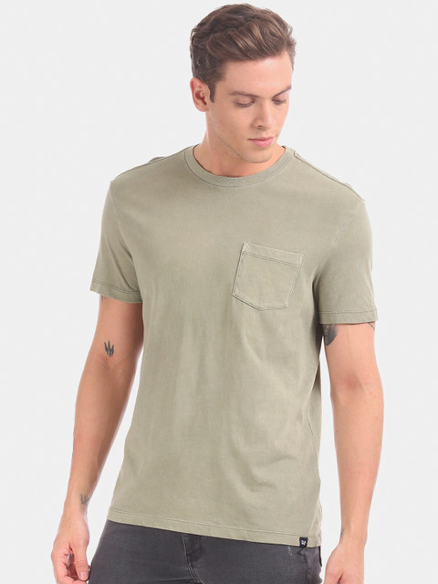 

GAP Men Beige Solid Round Neck T-shirt