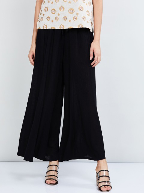 

max Women Black Solid Flared Palazzos