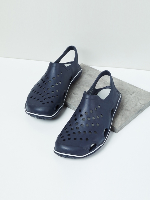 

max Men Navy Blue Solid Clogs