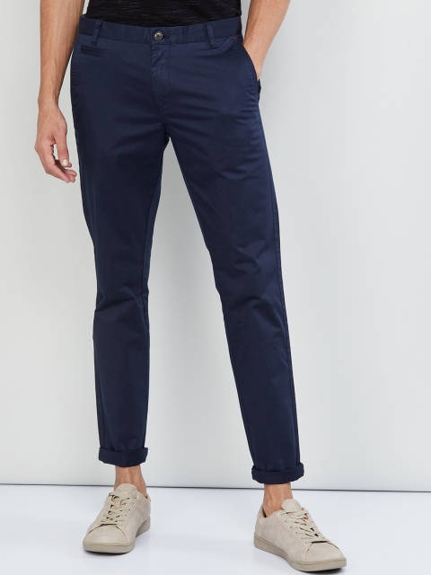

max Men Navy Blue Skinny Fit Solid Chinos