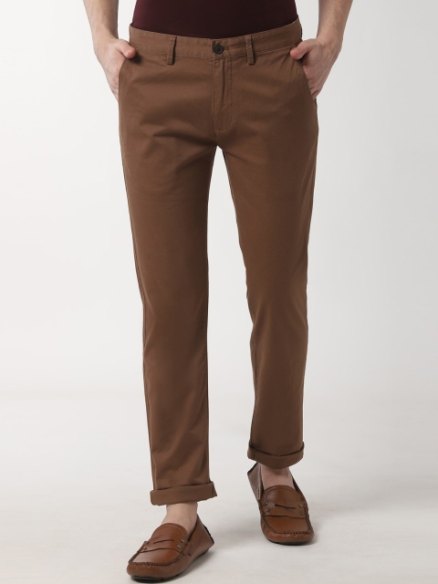 

Peter England Casuals Men Brown Slim Fit Solid Regular Trousers