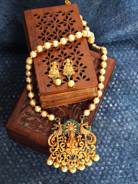 

ANIKAS CREATION Gold-Plated & Green Stone-Studded Traditional Maa Laxmi Temple Religious Jewellery Set