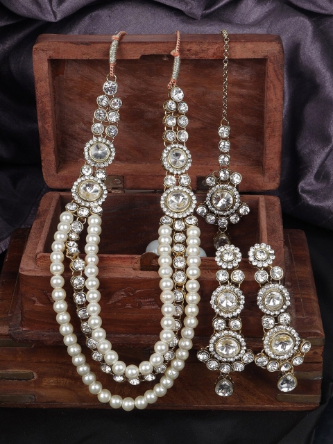 

ANIKAS CREATION Gold-Plated & White Stone Studded Handcrafted Traditional Rajwada Side Broch Multi Strand Jewellery Set