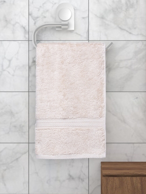 

SPACES Unisex Beige Solid 608 GSM Hand Towel