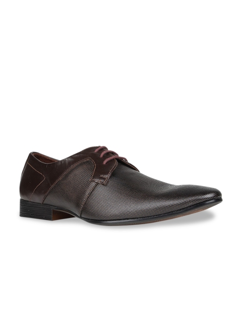 

Regal Men Brown Solid Leather Formal Derbys
