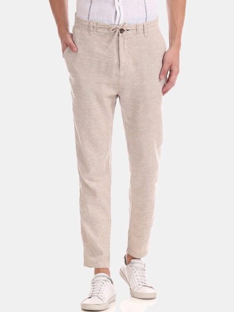 

Cherokee Men Beige Solid Regular Trousers
