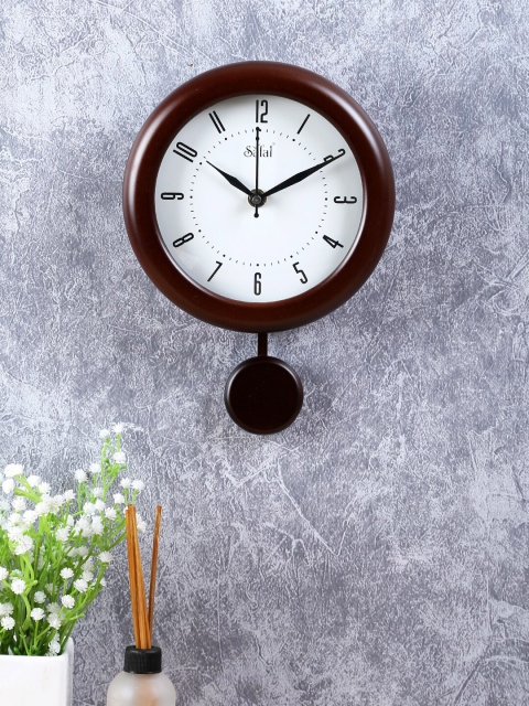 

Safal Brown & White Solid Round Wooden Mini Pendulum Wall Clock