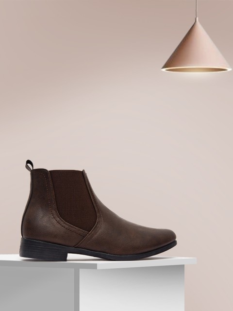 

shoexpress Women Brown Solid PU High-Top Flat Boots