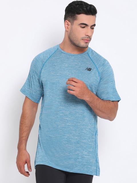 

New Balance Men Blue Solid Round Neck T-shirt
