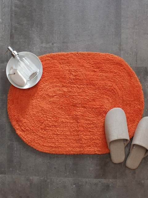 

House This Orange Solid Oval-Shaped 110 GSM Cotton Bath Rug