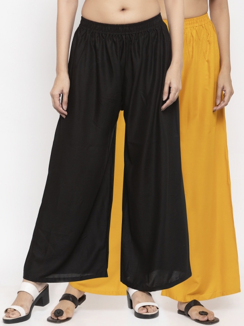 

NEUDIS Women Black & Yellow Solid Flared Palazzos