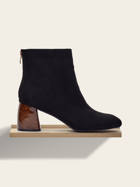 

shoexpress Women Black Solid Heeled Boots
