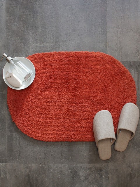 

House This Orange Solid Oval-Shaped 110 GSM Cotton Bath Rug