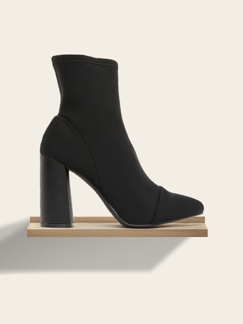 

shoexpress Women Black Solid Heeled Boots