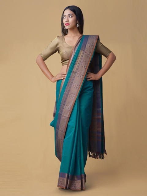 

Unnati Silks Green Solid Handcrafted Saree