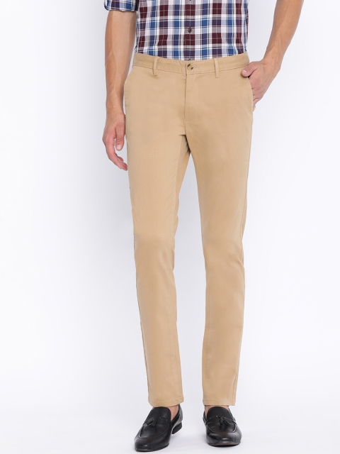 

Basics Men Beige Tapered Fit Solid Regular Trousers
