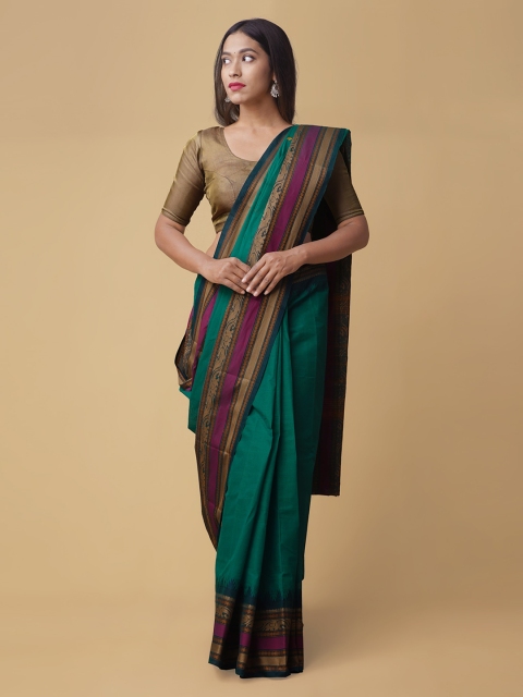 

Unnati Silks Green Solid Pure Cotton Saree