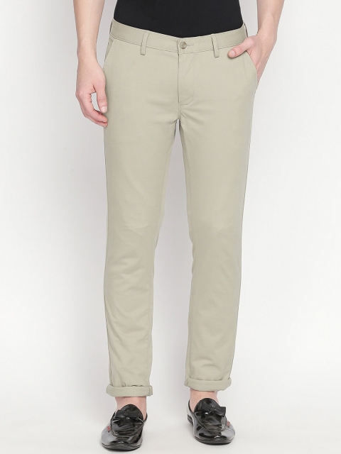 

Basics Men Beige Tapered Fit Solid Regular Trousers