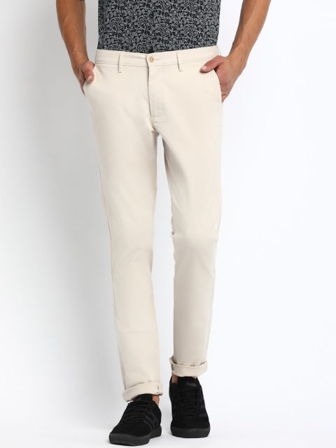

Basics Men Beige Tapered Fit Solid Chinos