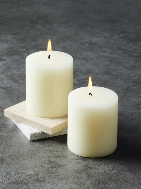 

Pure Home and Living Set Of 2 White Antique Lace Pillar Candles