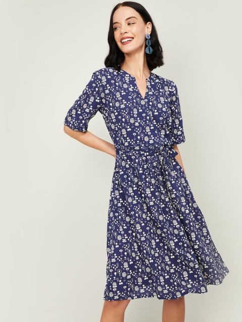 

Colour Me by Melange Women Blue Printed Wrap Dress