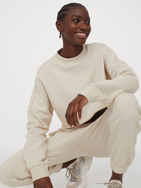 

H&M Women Beige Solid Cropped Sustainable Sweatshirt